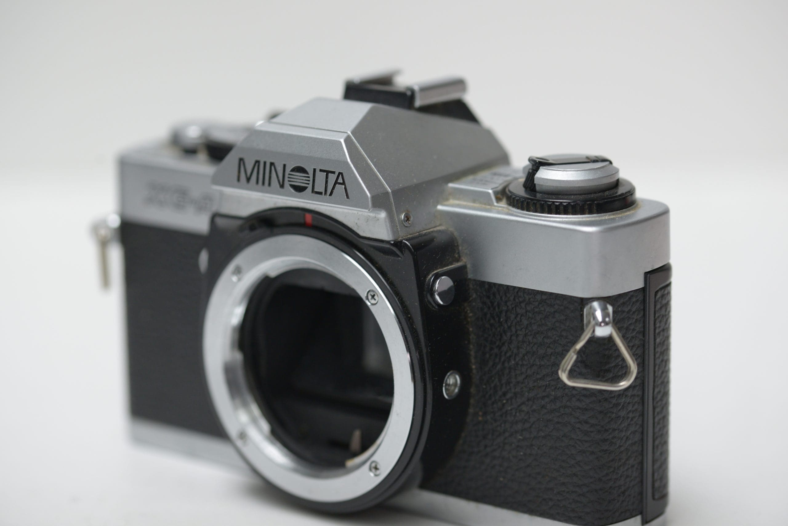 Minolta popular XG-A 35mm camera with lenses, manuals, etc